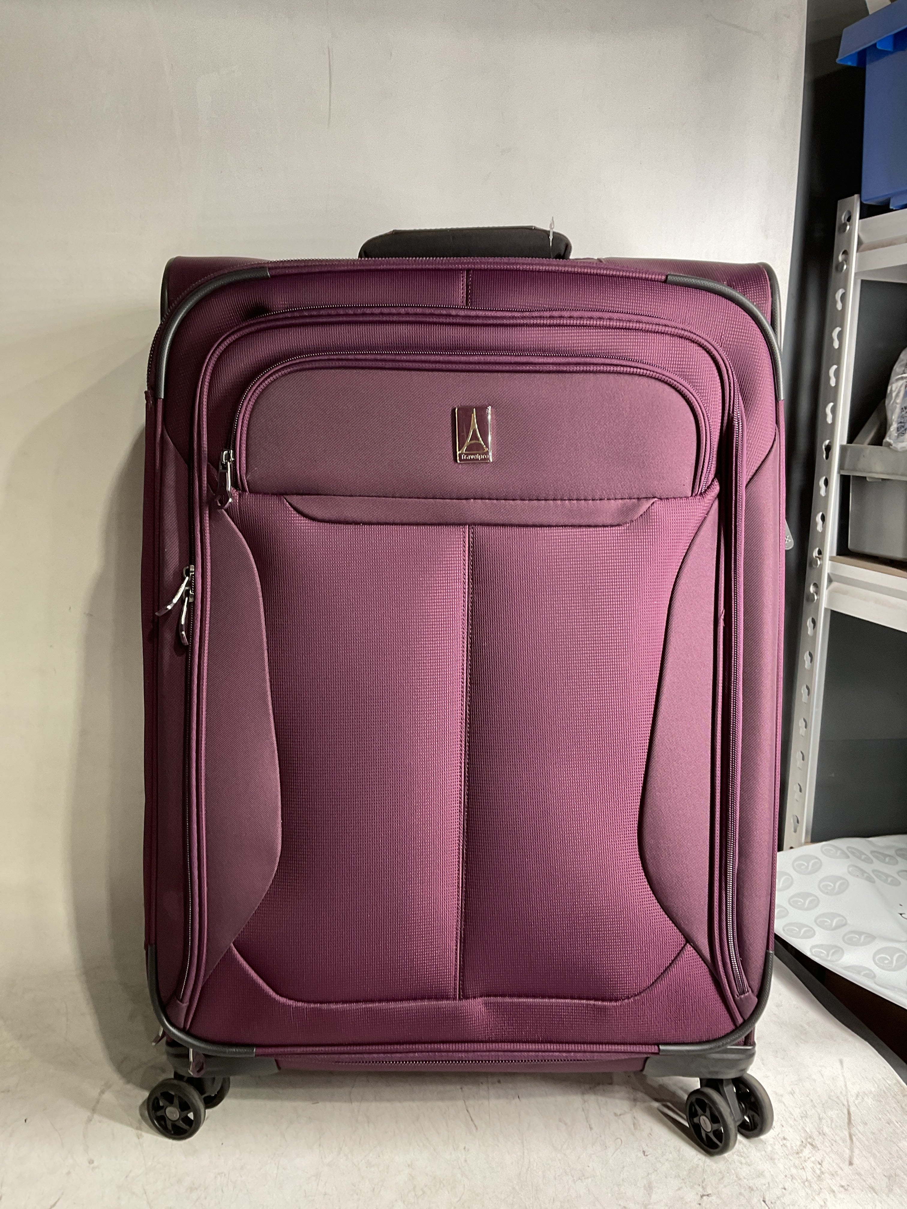 Travelpro Tourlite Softside Expandable Luggage with 4 Spinner Wheels, Lightweight Suitcase, Men and Women ( Deep Purple , Checked-Medium 25-Inch ) Deep Purple Checked Medium 25 Inch U2