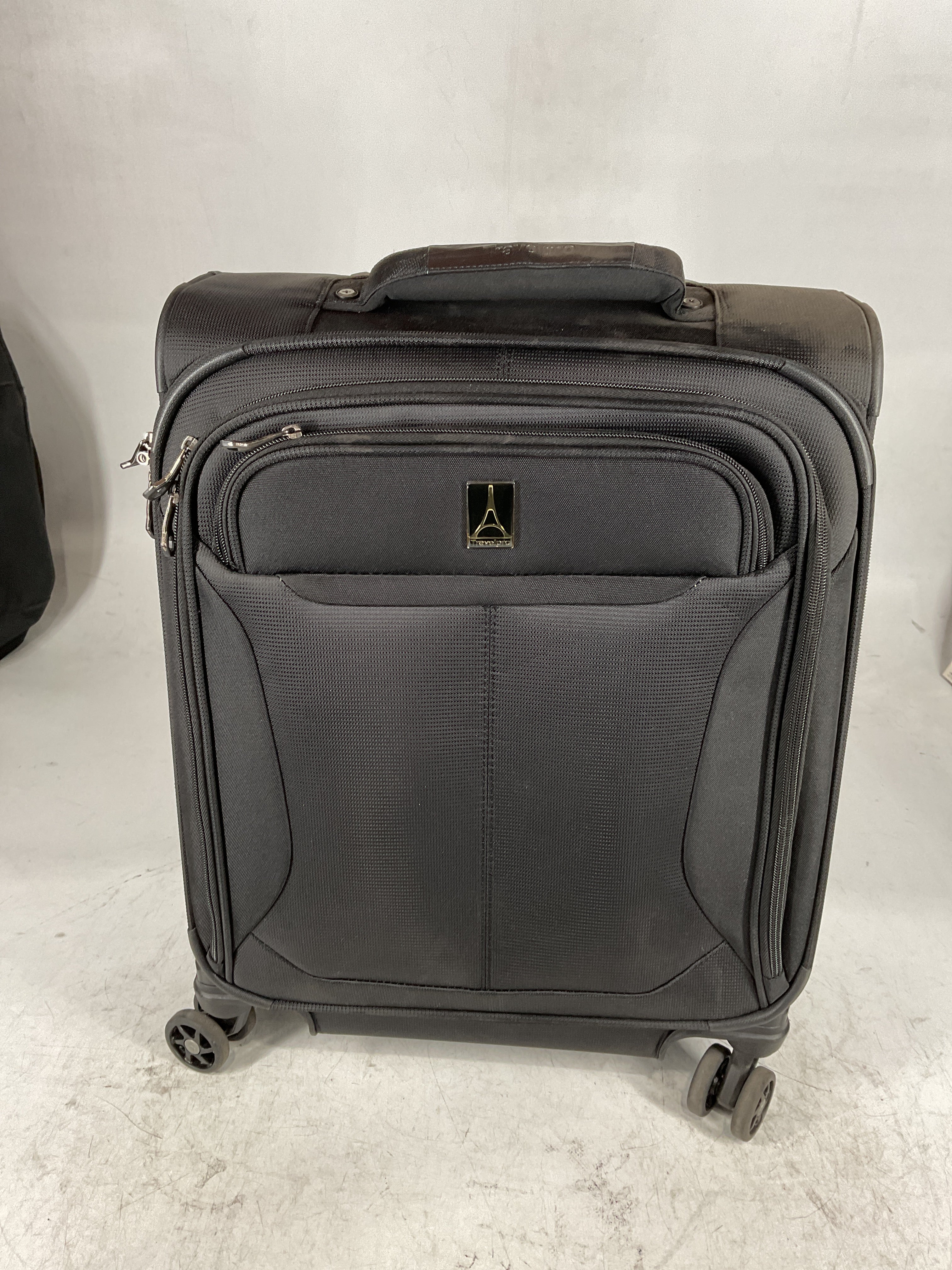 Travelpro Tourlite Softside Expandable Luggage with 4 Spinner Wheels, Lightweight Suitcase, Men and Women Black Carry On 19 Inch U10