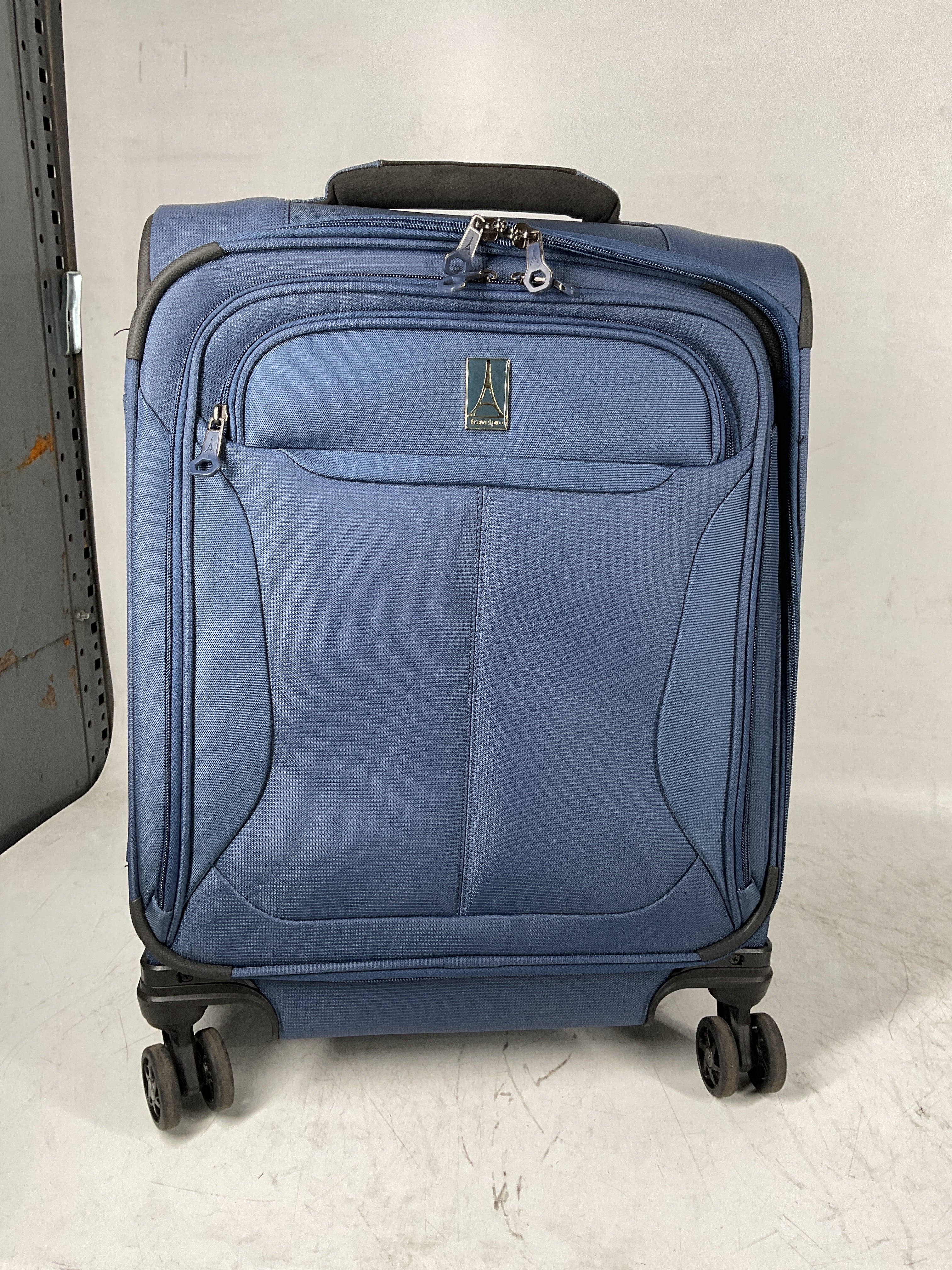 Travelpro Tourlite Softside Expandable Luggage with 4 Spinner Wheels, Lightweight Suitcase, Men and Women Blue Carry On 19 Inch U7