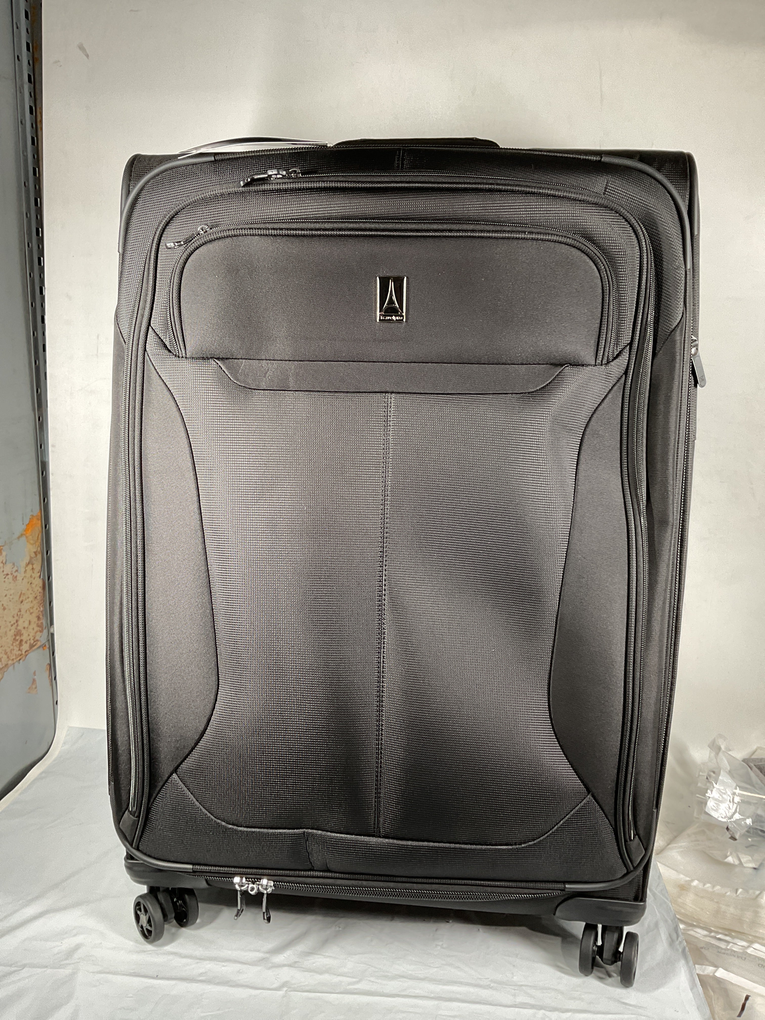 Travelpro Tourlite Softside 29" Expandable Luggage with 4 Spinner Wheels, Lightweight Suitcase, Checked Large ( Black , Checked-Large 29-Inch ) Black Checked Large 29 Inch U14