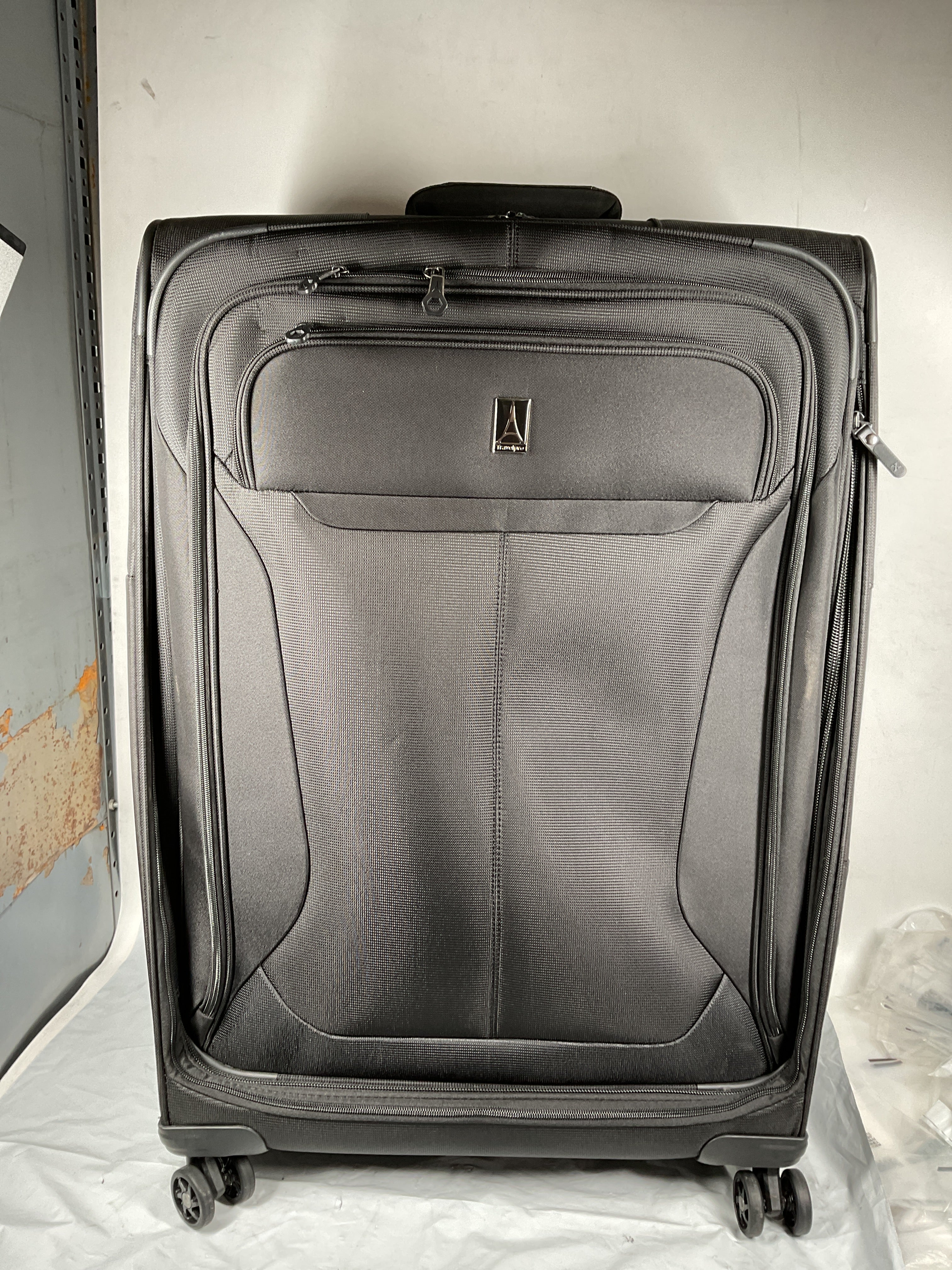 Travelpro Tourlite Softside 29" Expandable Luggage with 4 Spinner Wheels, Lightweight Suitcase, Checked Large ( Black , Checked-Large 29-Inch ) Black Checked Large 29 Inch U15