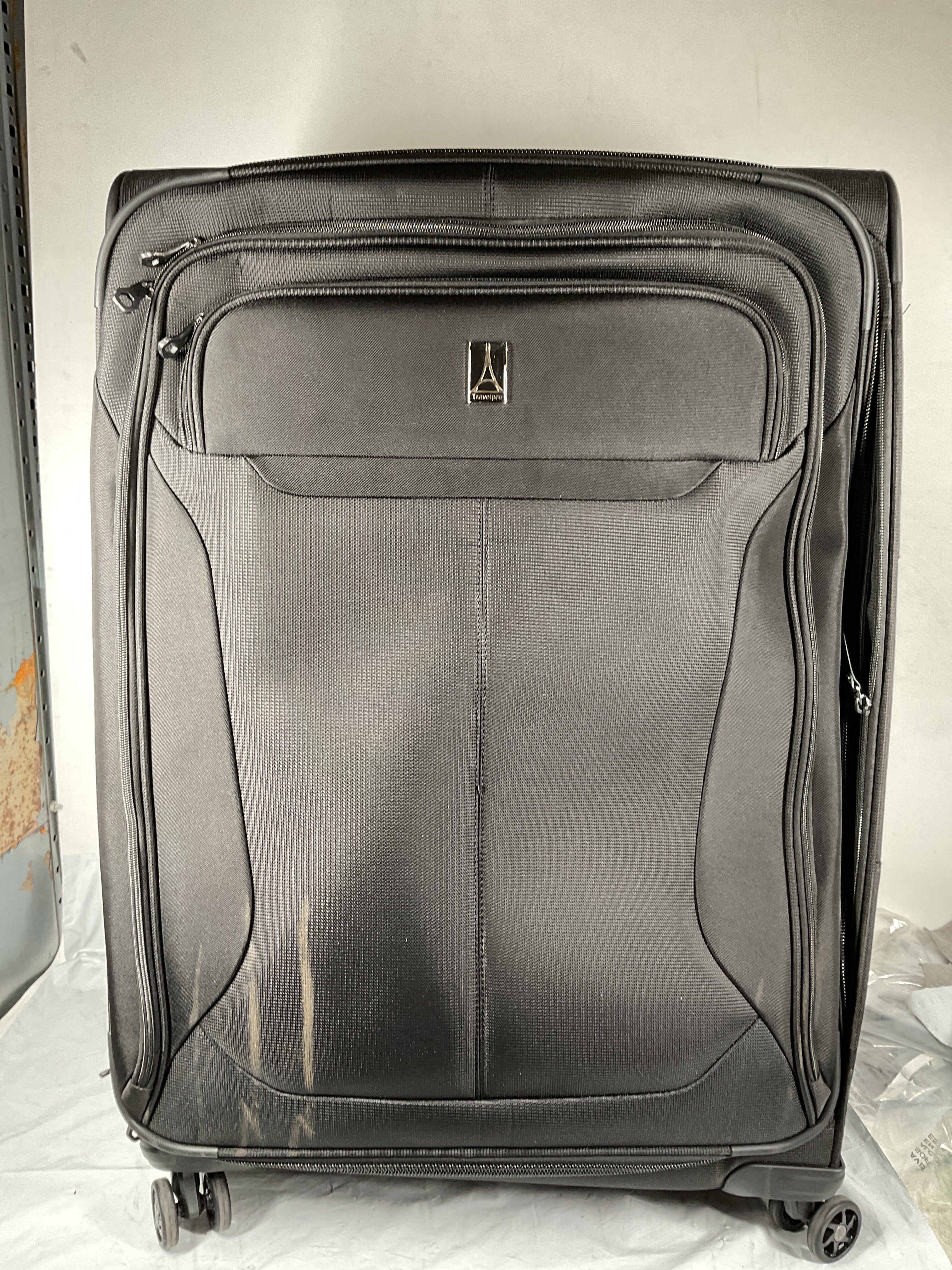 Travelpro Tourlite Softside 29" Expandable Luggage with 4 Spinner Wheels, Lightweight Suitcase, Checked Large ( Black , Checked-Large 29-Inch ) Black Checked Large 29 Inch U16