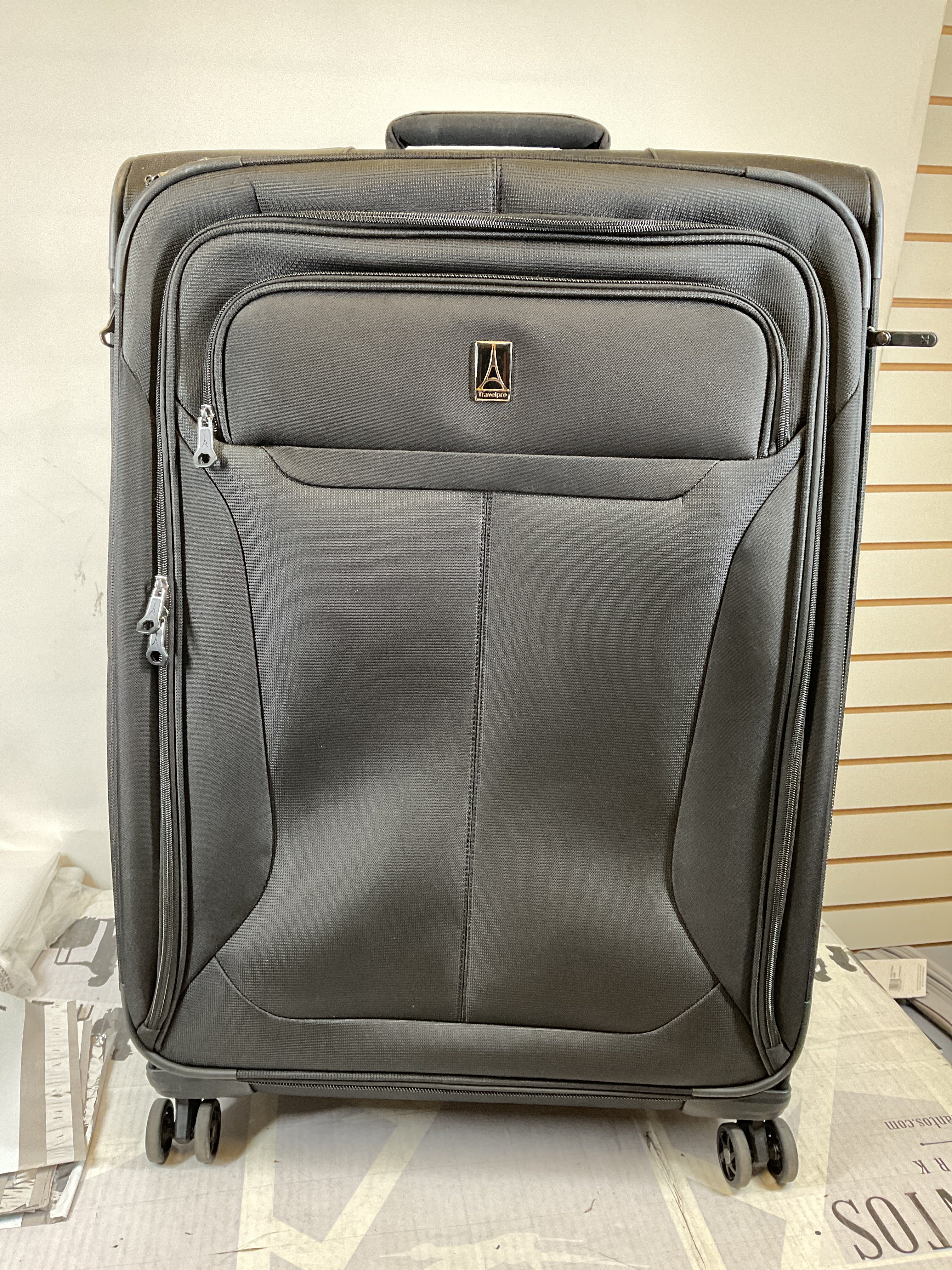Travelpro Tourlite Softside 29" Expandable Luggage with 4 Spinner Wheels, Lightweight Suitcase, Checked Large ( Black , Checked-Large 29-Inch ) Black Checked Large 29 Inch U17