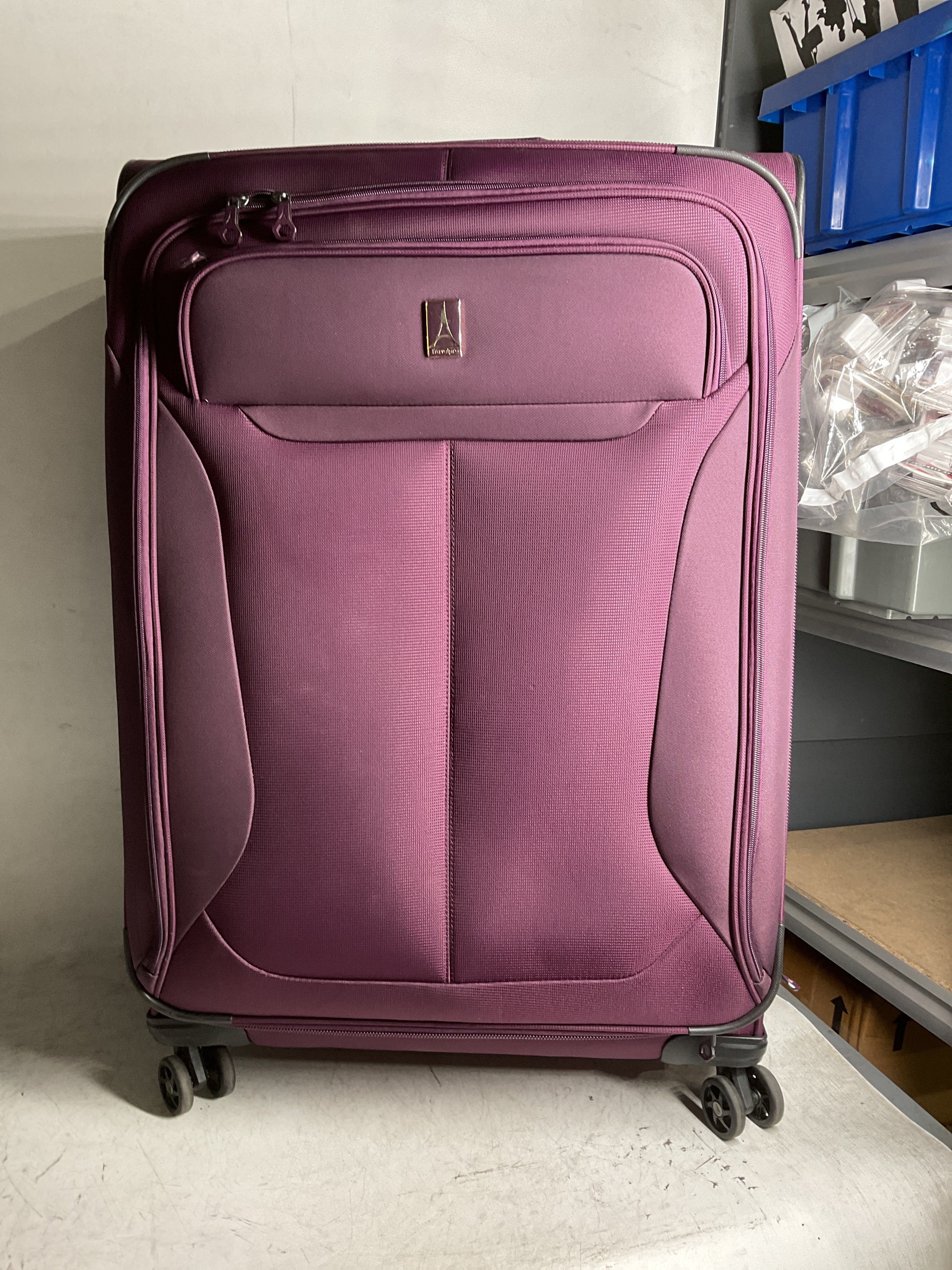 Travelpro Tourlite Softside Expandable Luggage with 4 Spinner Wheels, Lightweight Suitcase, Men and Women ( Deep Purple , Checked-Large 29-Inch ) Deep Purple Checked Large 29 Inch U1