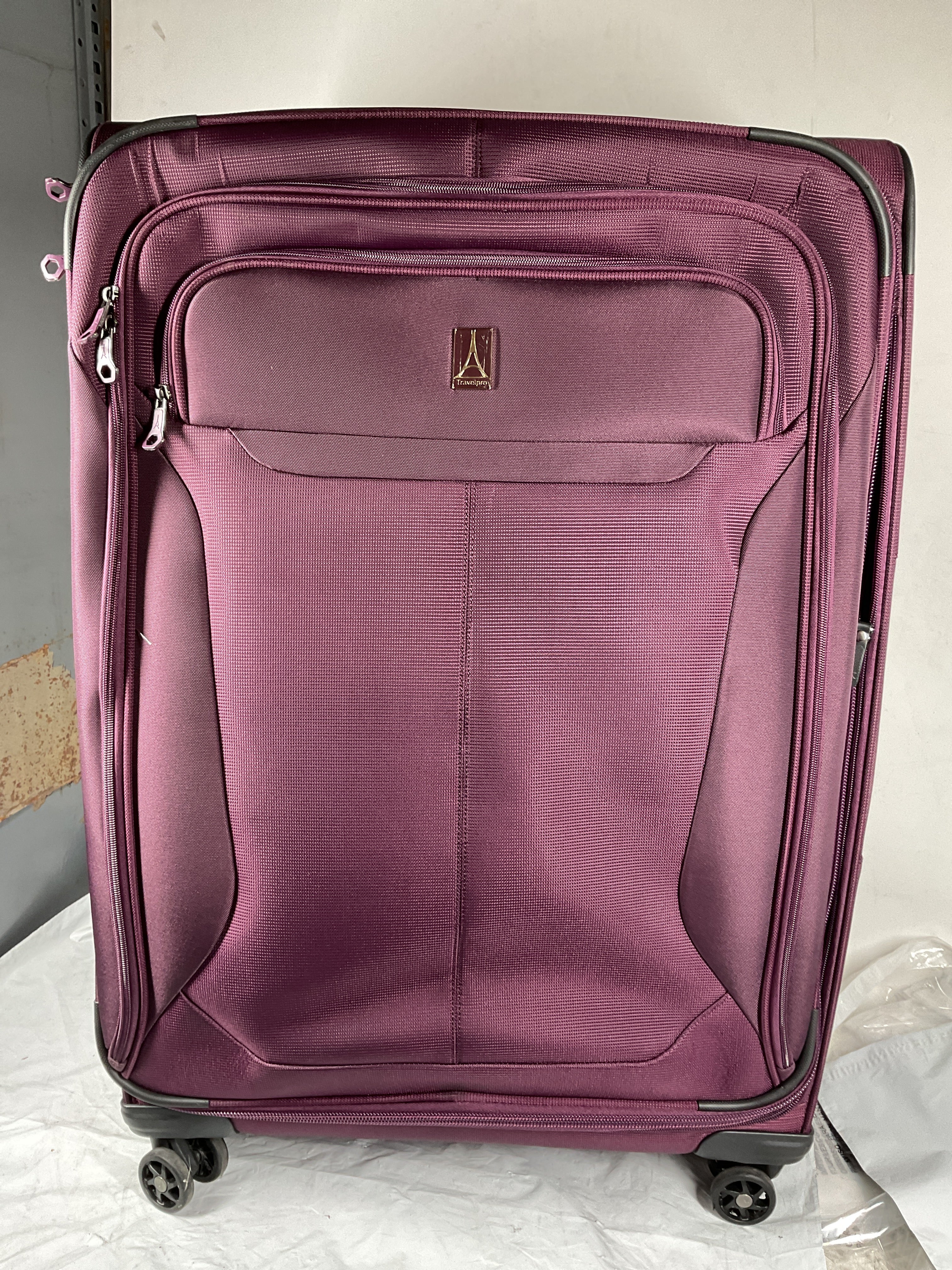Travelpro Tourlite Softside 29" Expandable Luggage with 4 Spinner Wheels, Lightweight Suitcase, Checked Large ( Deep Purple , Checked-Large 29-Inch ) Deep Purple Checked Large 29 Inch U12
