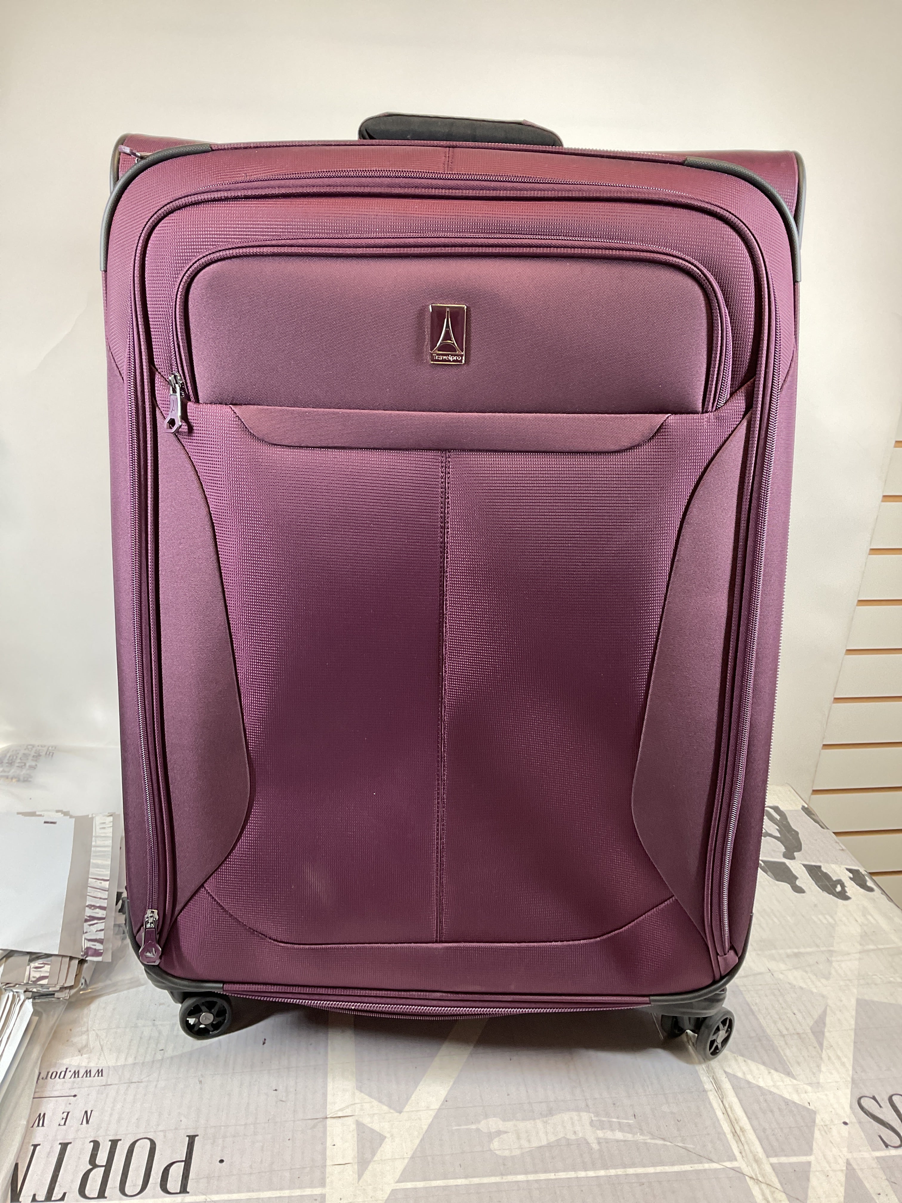 Travelpro Tourlite Softside 29" Expandable Luggage with 4 Spinner Wheels, Lightweight Suitcase, Checked Large ( Deep Purple , Checked-Large 29-Inch ) Deep Purple Checked Large 29 Inch U15