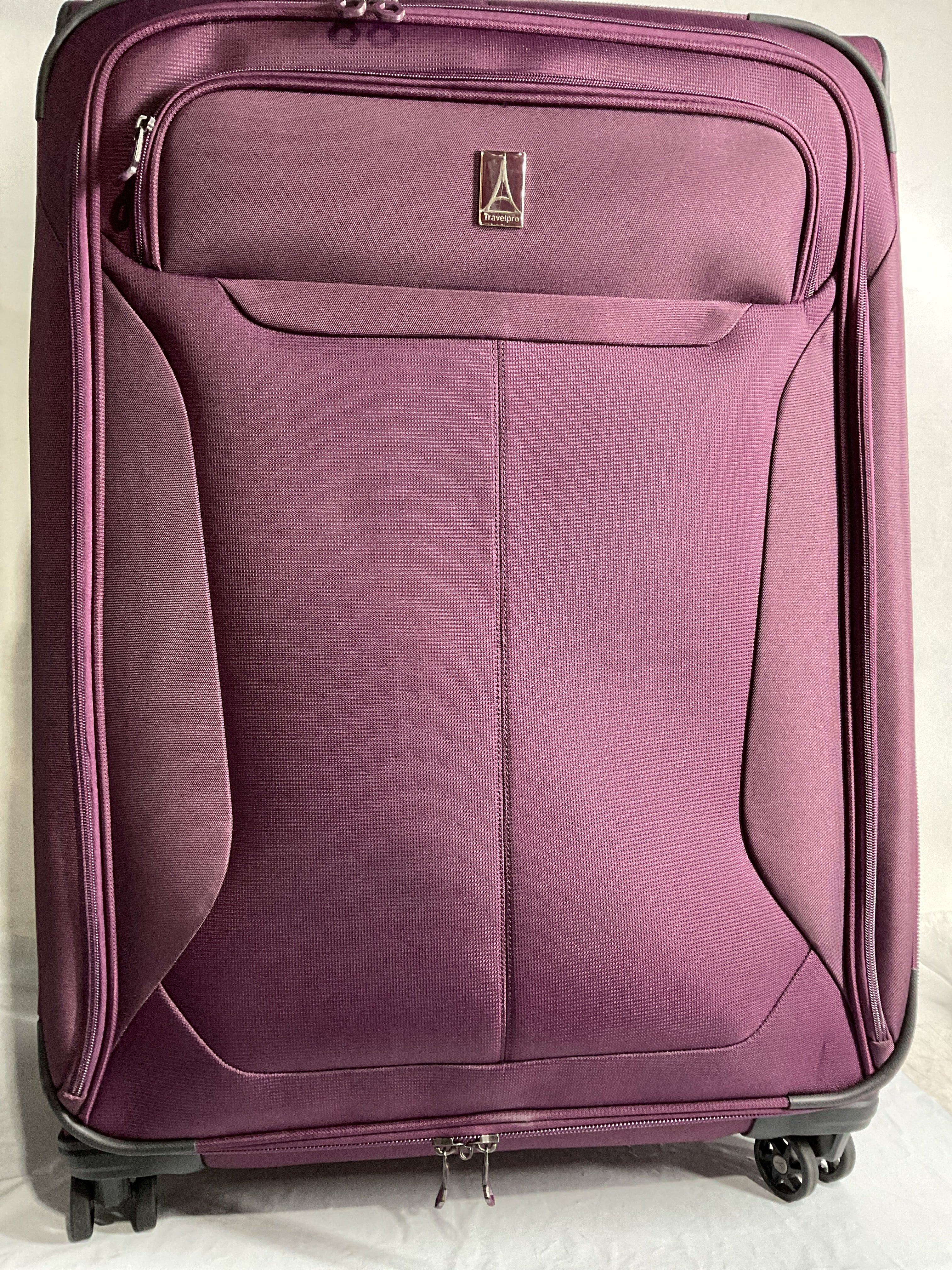 Travelpro Tourlite Softside Expandable Luggage with 4 Spinner Wheels, Lightweight Suitcase, Men and Women ( Deep Purple , Checked-Large 29-Inch ) Deep Purple Checked Large 29 Inch U2