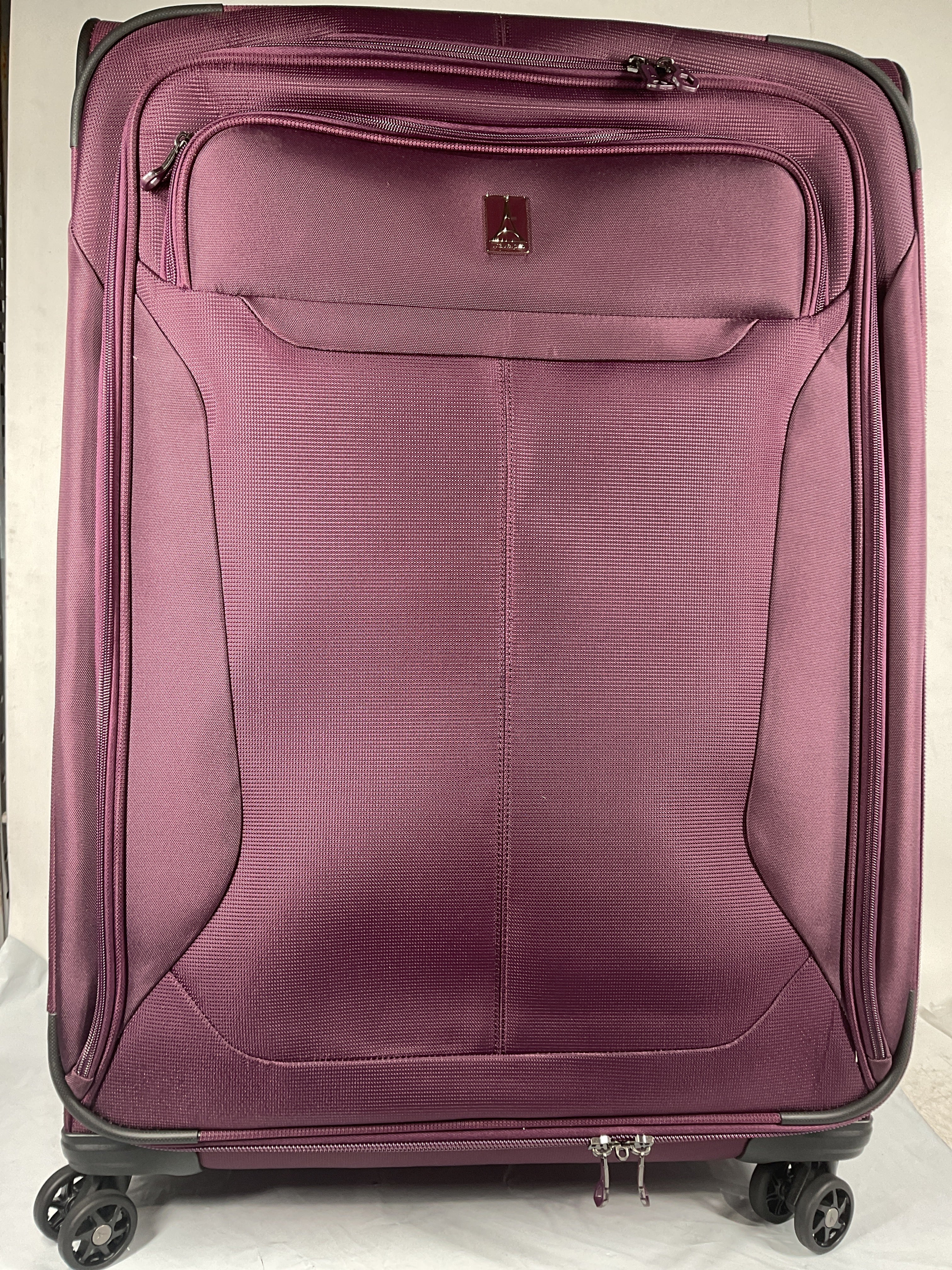Travelpro Tourlite Softside Expandable Luggage with 4 Spinner Wheels, Lightweight Suitcase, Men and Women ( Deep Purple , Checked-Large 29-Inch ) Deep Purple Checked Large 29 Inch U3