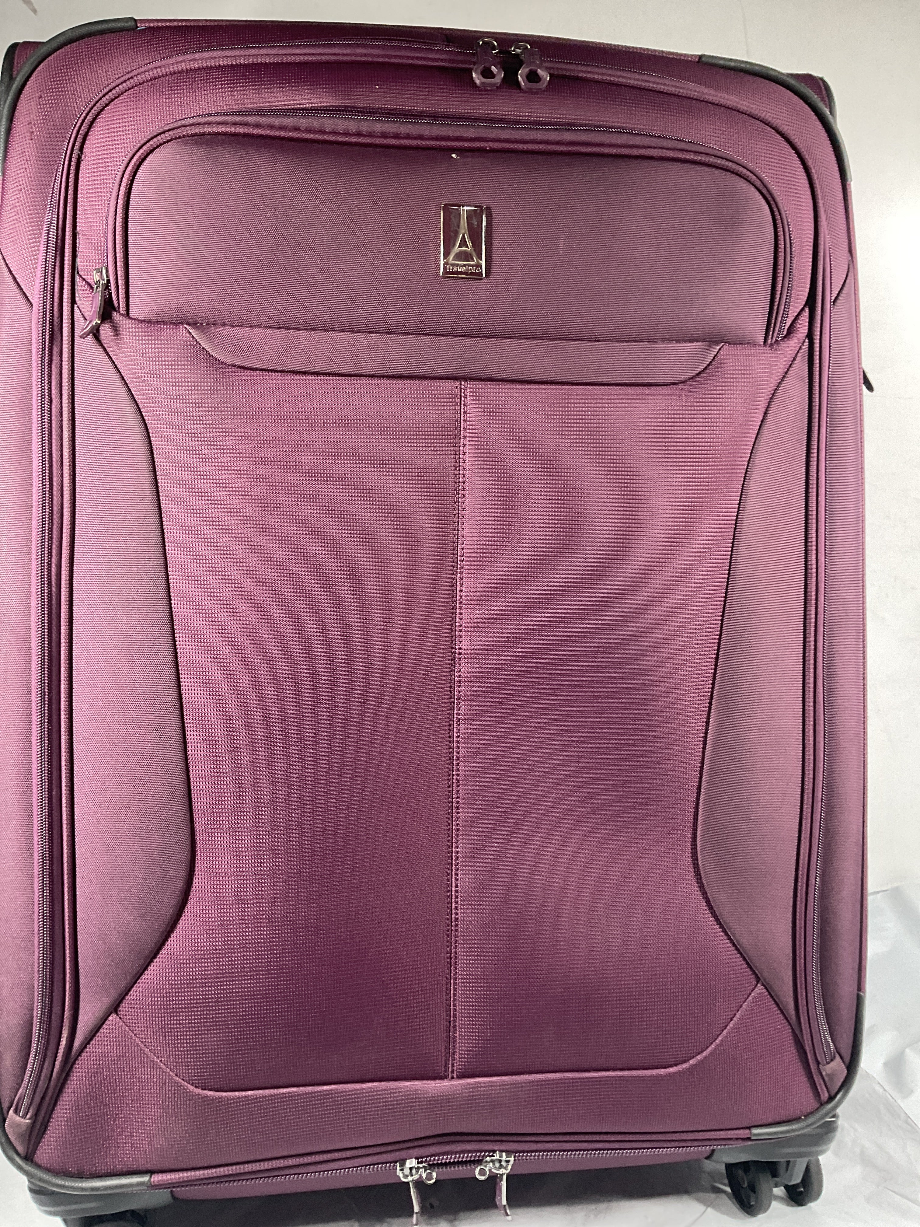 Travelpro Tourlite Softside Expandable Luggage with 4 Spinner Wheels, Lightweight Suitcase, Men and Women ( Deep Purple , Checked-Large 29-Inch ) Deep Purple Checked Large 29 Inch U6