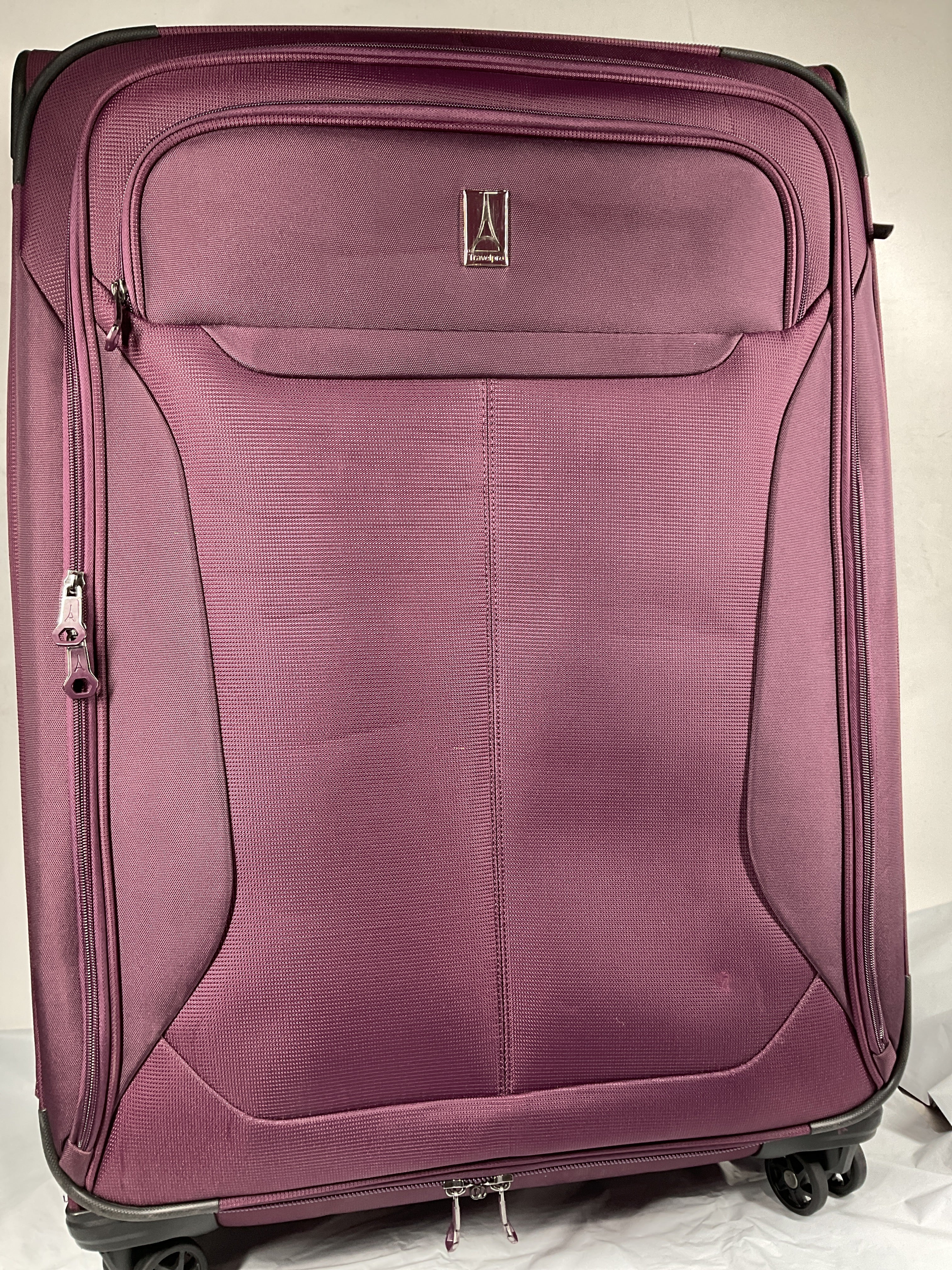 Travelpro Tourlite Softside Expandable Luggage with 4 Spinner Wheels, Lightweight Suitcase, Men and Women ( Deep Purple , Checked-Large 29-Inch ) Deep Purple Checked Large 29 Inch U7