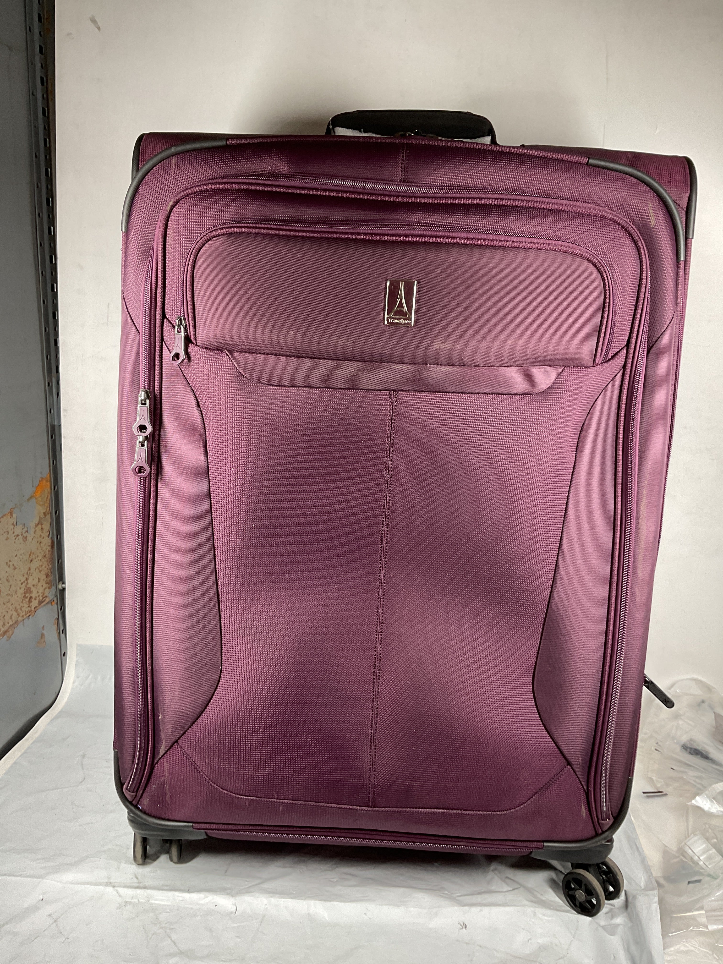 Travelpro Tourlite Softside 29" Expandable Luggage with 4 Spinner Wheels, Lightweight Suitcase, Checked Large ( Deep Purple , Checked-Large 29-Inch ) Deep Purple Checked Large 29 Inch U8
