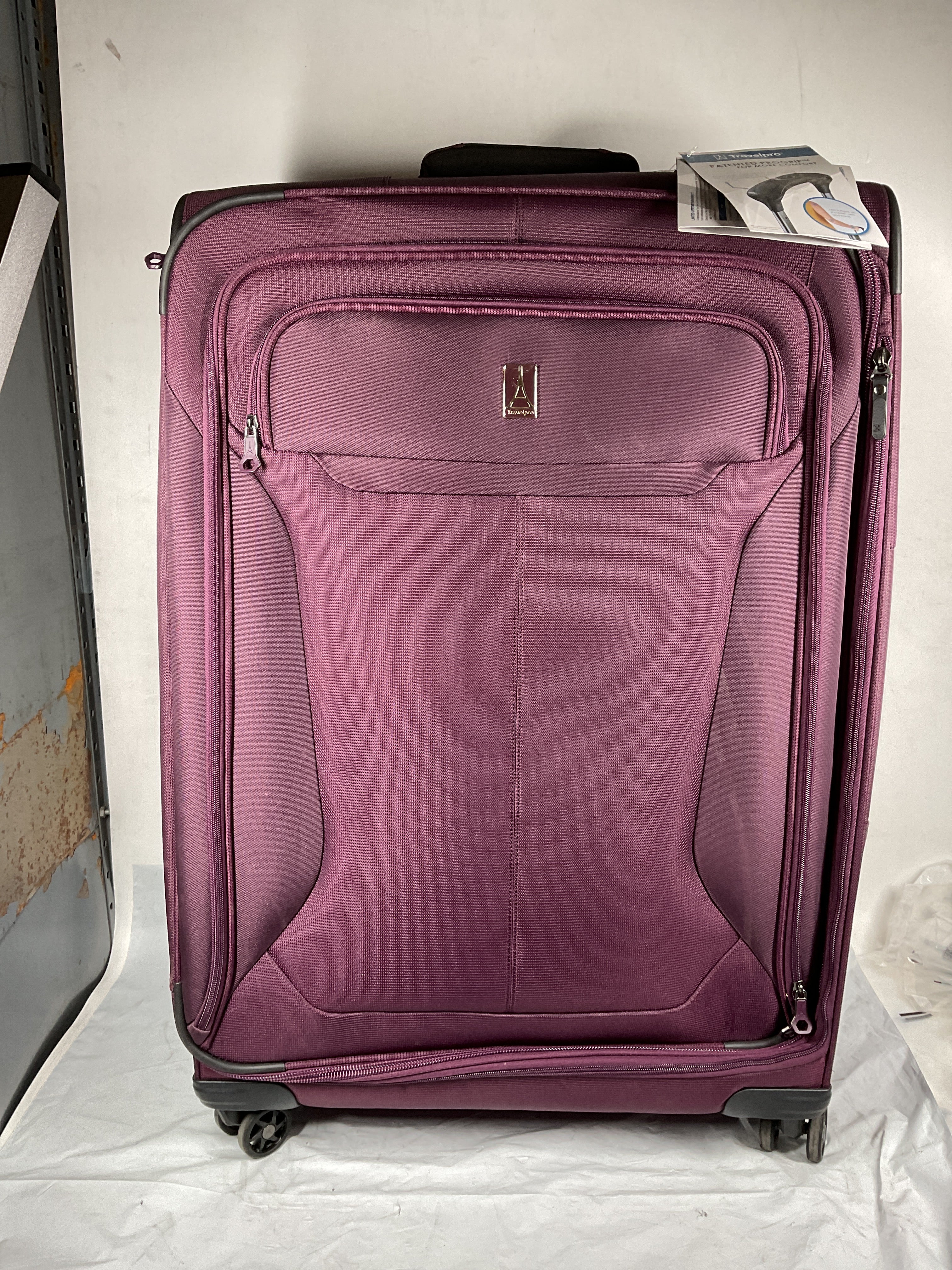 Travelpro Tourlite Softside 29" Expandable Luggage with 4 Spinner Wheels, Lightweight Suitcase, Checked Large ( Deep Purple , Checked-Large 29-Inch ) Deep Purple Checked Large 29 Inch U9