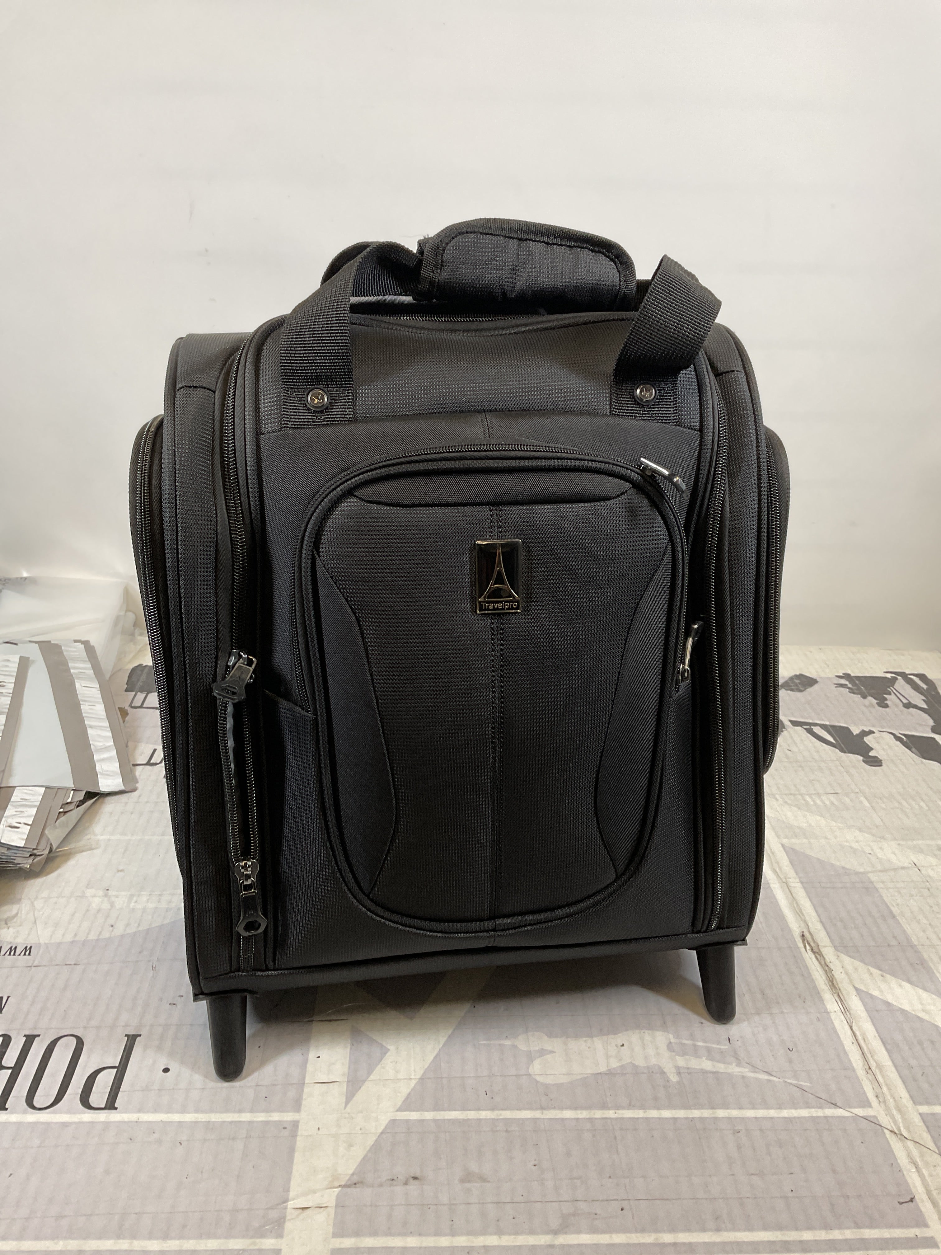 Travelpro Tourlite Softside Lightweight Rolling Underseat Compact Carry-On Upright 2 Wheel Bag, Men and Women, 15-Inch ( Black , One Size ) Black One Size U33