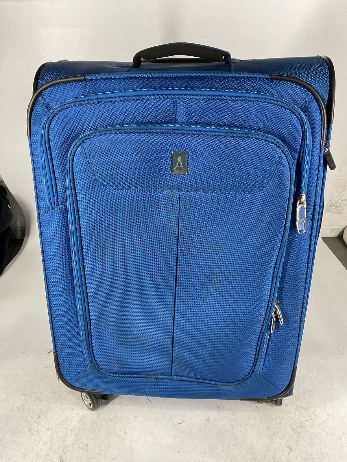 Travelpro 25 in Checked 4 Wheel Luggage  U1