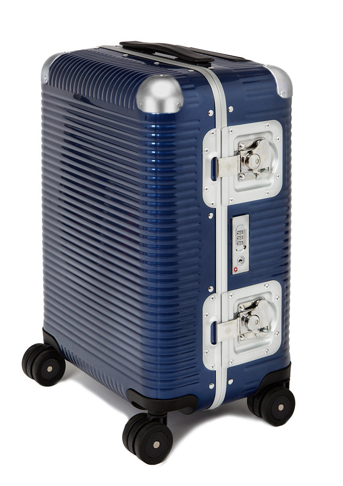 FPM Milano Bank Light Spinner, Durable Luxury Luggage Made in Italy, 4-Wheeled Smooth Dual Spinner Wheels, TSA Lock and Butterfly Clips for Safety ( Indigo Blue , 53 ) Indigo Blue 53 U1